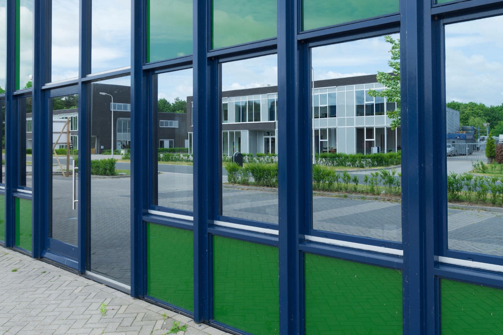 reflective window tinting on a the windows of a building