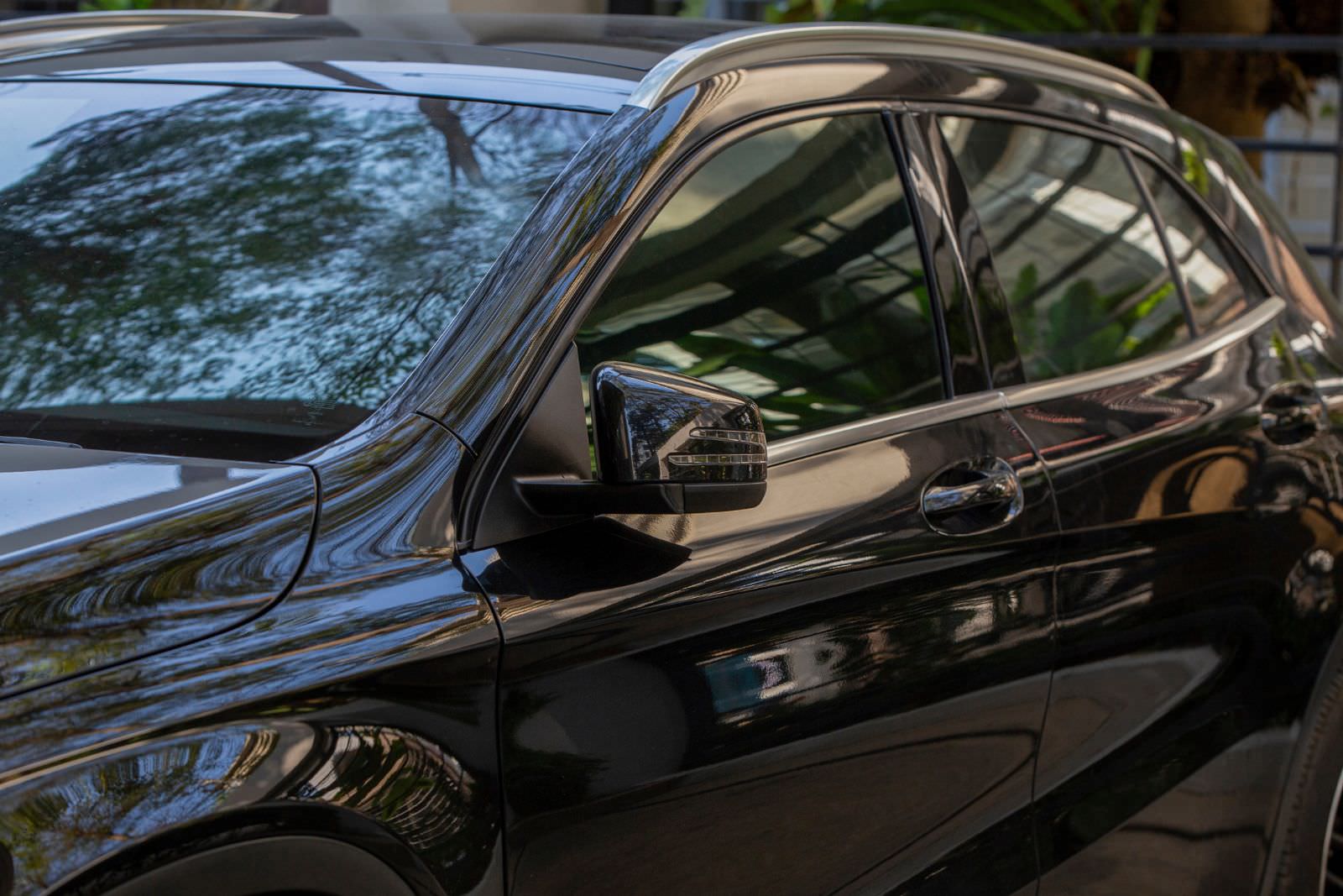 a black car with dark window tinting
